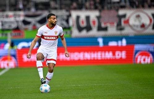 Josha Vagnoman VfB Stuttgart (04) Action on the ball behind fan block VfB Stuttgart with Ultras,