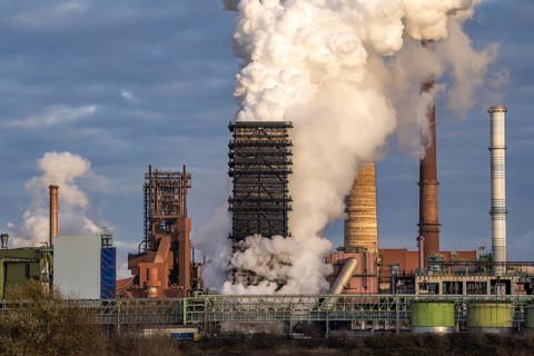 Industrial backdrop of the ThyssenKrupp Steel steelworks in Duisburg-Bruckhausen, on the Rhine,
