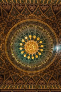Dome and illuminated chandelier in the Sultan Qaboos Mosque, Muscat, Arabian Peninsula, Sultanate
