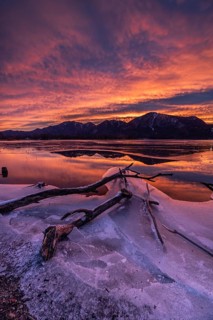 Dawn, mountains reflected in lake, clouds, ice, frozen, winter, Lake Kochel, view of Rabenkopf,