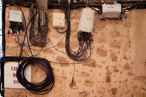Electrical cables, laid on the outside of the house wall, Valldemossa, Tramuntana Mountains, Serra