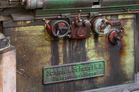 Detail with company sign of a workbench in the production hall of engine valves, formerly Dietz &