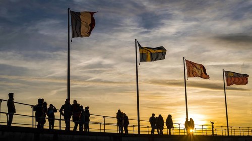 People, silhouettes, flags, harbour in Lindau on Lake Constance, Bavaria, Germany, Europe