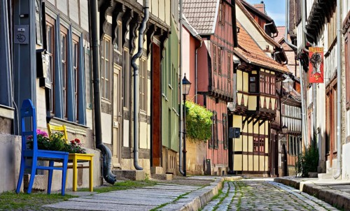 Idyllic narrow alley with half-timbered houses and cobblestones in the historic old town, UNESCO