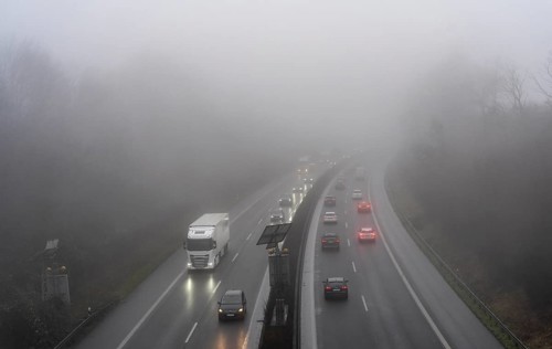 Dense fog, with visibility sometimes less than 100 metres, A52 motorway, in Essen, North