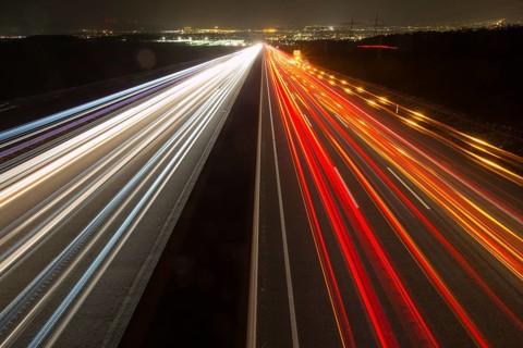 A7 Motorway, Autobahn, beside Kassel at night with light trails from the traffic headlights and