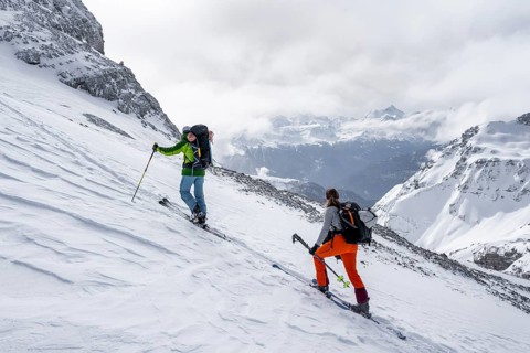 Ski tourers in a snowy mountain landscape, ascent to the Wildhorn, cloudy mood, high tour, Bernese
