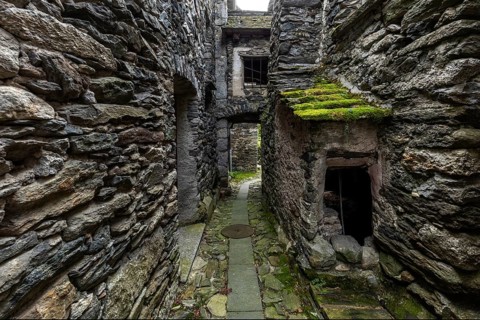 Typical Ticino stone houses in a narrow alley in the mountain village of Bordei, Centovalli, Canton