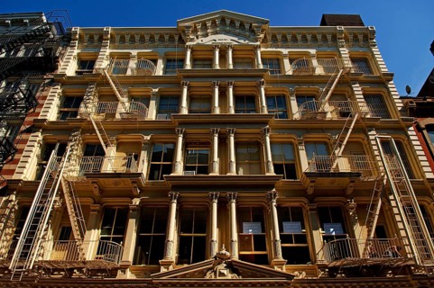 Neoclassical house facade with fire escapes, Downtown, New York City, USA, North America