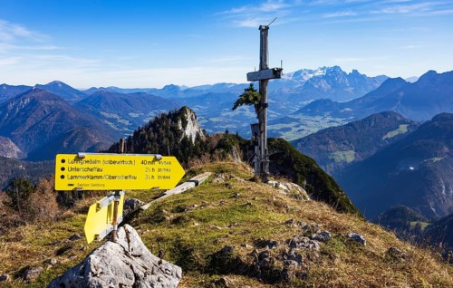 Old summit cross on the Schwarzer Berg with a view of the Dachstein massif, Golling,