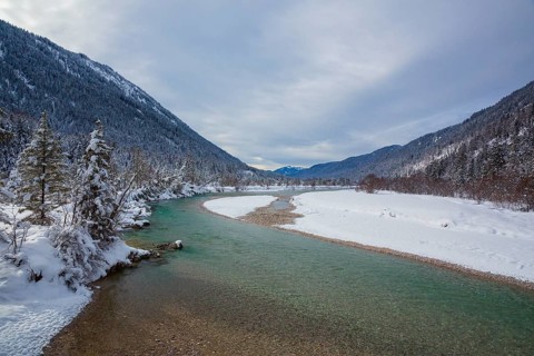 Isar valley in winter at temperatures of minus 18 degrees Celsius. Snow covered landscape with the