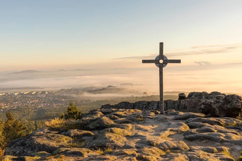 Summit cross on the Töpfer with a view of Olbersdorf and Zittau with morning mist, Zittauer