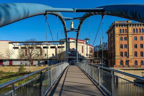 Pedestrian bridge with Golden Rat over the Weser in Hameln, Lower Saxony, Germany, Europe