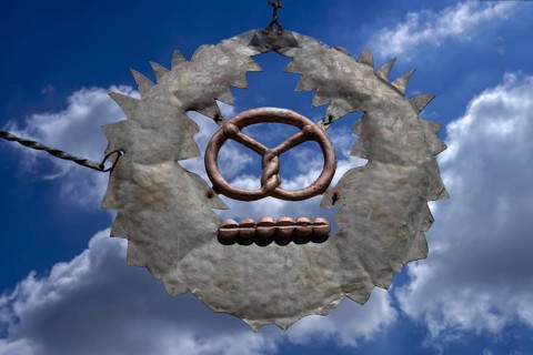 Nose sign of a café against a cloudy sky, Egloffstein, Upper Franconia, Bavaria, Germany, Europe