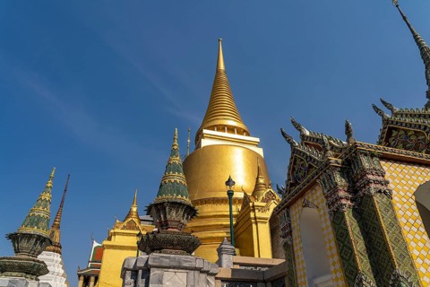 Golden Phra Sri Rattana Chedi in Wat Phra Kaeo, the king's Buddhist temple, Grand Palace Bangkok,