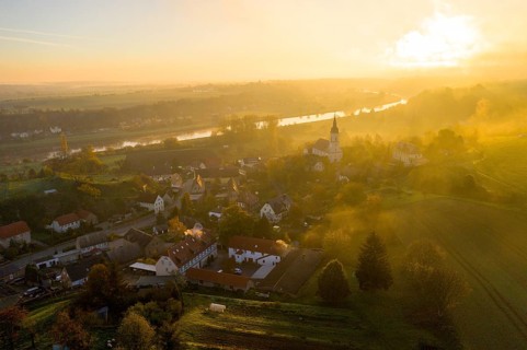 Aerial view, view of the town with St Michael's Church at sunrise, the Elbe in the background,
