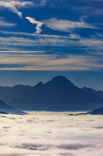 View from Schwarzenberg to a sea of fog in the Salzach valley with Watzmann, Osterhorn group,