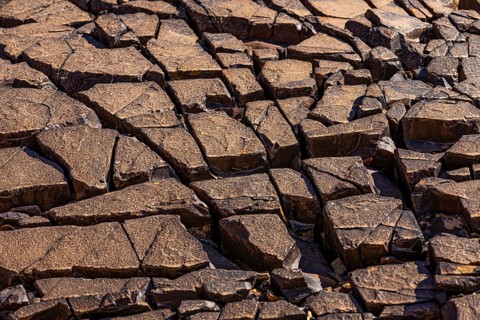 Split rock slabs at the Beehive Tombs, near the town of Al Ayn, Arabian Peninsula, Sultanate of