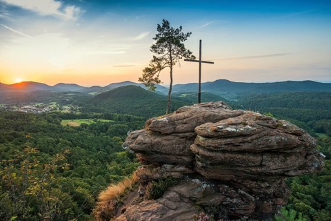 Sandstone rock with pine tree and summit cross, Rötzenfelsen, sunrise, Gossersweiler-Stein,
