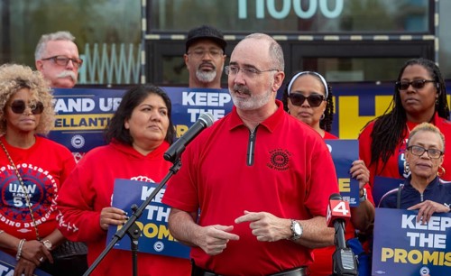 Detroit, Michigan USA, 30 October 2024, UAW President Shawn Fain addresses the crowd as members of