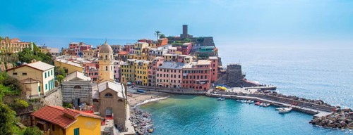 Cinque Terre, Italy, Scenic view of Vernazza shoreline and colorful buildings in a bay, Europe