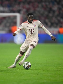 Alphonso Davies Bayern FC Munich FCB (19) Action on the ball UEFA Champions League Allianz Arena,