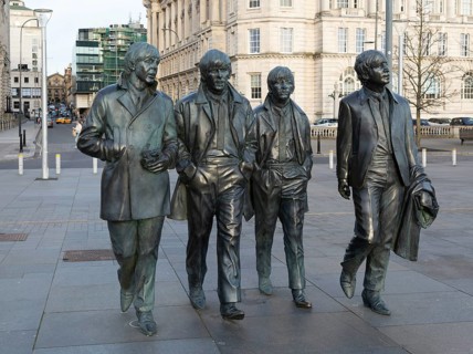 The Beatles statues sculpture by Anthony Edwards, Pier Head, Liverpool, England, UK