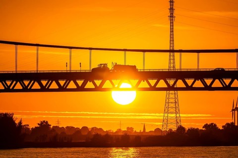 Traffic on the Rhine bridge Emmerich, federal road B220, evening light, with 803 m the longest
