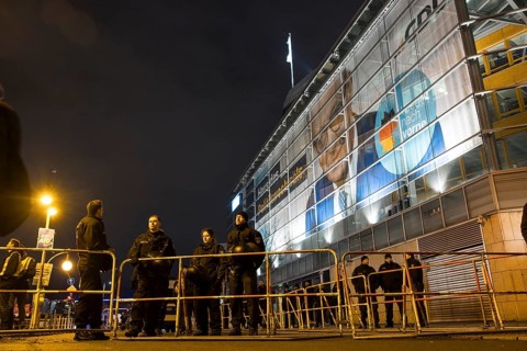 Police officers protect the CDU party headquarters during the demonstration under the slogan