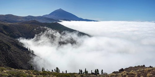 Panorama from east over the Teide National Park, Parque Nacional del Teide, with trade wind clouds,