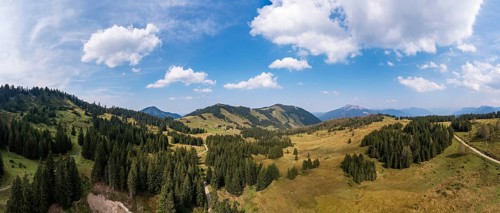 Drone shot of the Illingeralm with a view of the Pillsteinhöhe and Zwölferhorn, Osterhorn group,