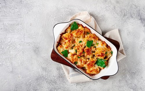 Baked cauliflower, in cream sauce, with cheese and spices, homemade, no people