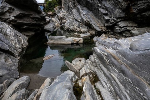 Rocks, granite rock formations in the Maggia River near Ponte Brolla, in the Maggia Valley, Valle