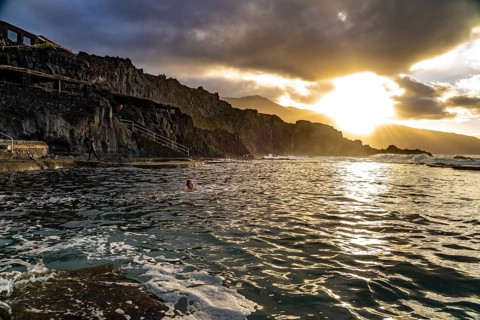 Sunset at the natural swimming pool La Maceta, El Hierro, Canary Islands, Spain, Europe