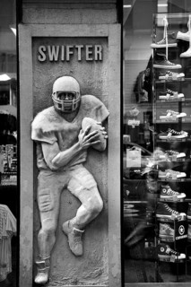 Rugby figure in a sports shop, New York City, USA, North America