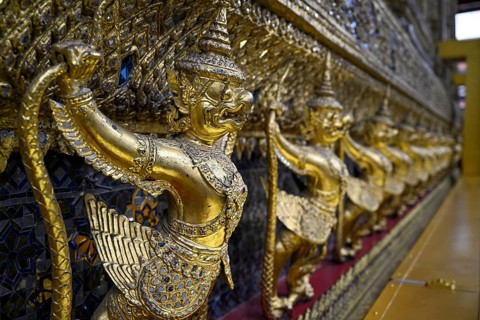 Golden sculptures of Garuda and Naga, Wat Phra Kaew, Temple of the Emerald Buddha, Bangkok,