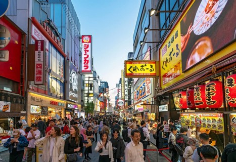 Night-time street with neon lights and illuminated signboards, Dotonbori district, Osaka, Japan,