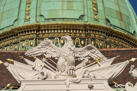 Eagle on the dome of St Michael's Wing of the Hofburg Imperial Palace Palace in Vienna, Austria,