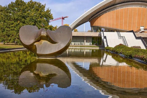 House of World Cultures with sculpture Butterfly by Henry Moore and reflection on the water surface