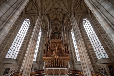 High altar, completed in 1642, replaced by neo-Gothic carvings in 1856, late Gothic hall church of
