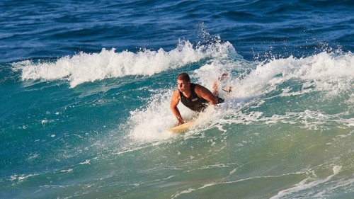 Surfer fights against the powerful waves in the blue ocean, wave surfer, surfer, surf, waves, west