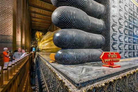 Wat Pho, temple of the reclining Buddha. Sightseeing attraction, architecturally significant temple