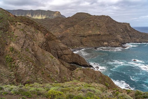 The rocky coast and the beach Playa de la Caleta near Hermigua, La Gomera, Canary Islands, Spain,