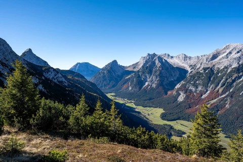 Mountain landscape in autumn, view of the Leutasch valley with mountain peak of the Wetterstein