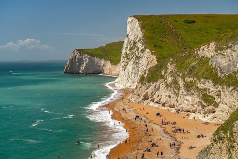 White cliffs and beach of the UNESCO World Heritage Site Jurassic Coast, England, Great Britain