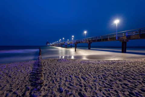 Pier with diving gondola in the morning at the blue hour, breakwater, Zingst,