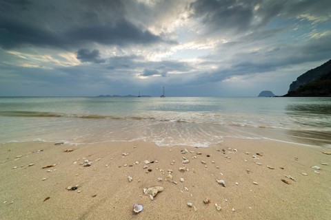 Sunrise at the shell-lined Charlie Beach, Koh Mook Island, Andaman Sea, Satun Province, Southern