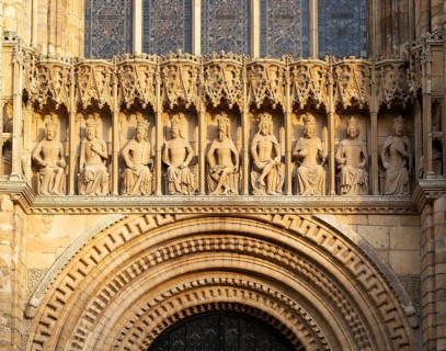 Carved stonework figures of kings, Gallery of Kings, frontage of cathedral church, Lincoln,
