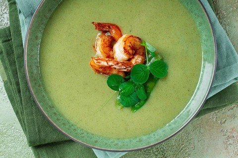 Pea cream soup, with shrimp, green soup, homemade, top view, no people
