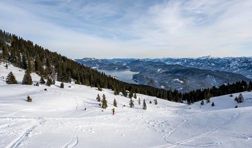 Ski tourers climbing Simetsberg, view of Walchensee, Estergebirge, Bavarian Prealps, Bavaria
